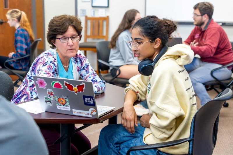 Dr Sumner working with a student