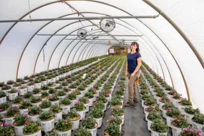 Lauren Gregory in greenhouse
