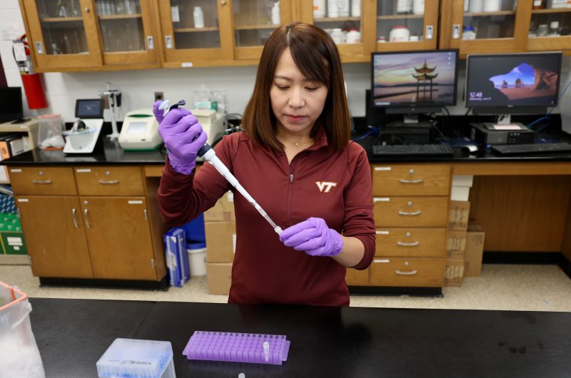 Yuan Zeng in a lab doing research