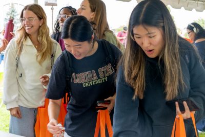 Photo of students lined up to get some merch