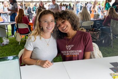 Two female students posed and smiling