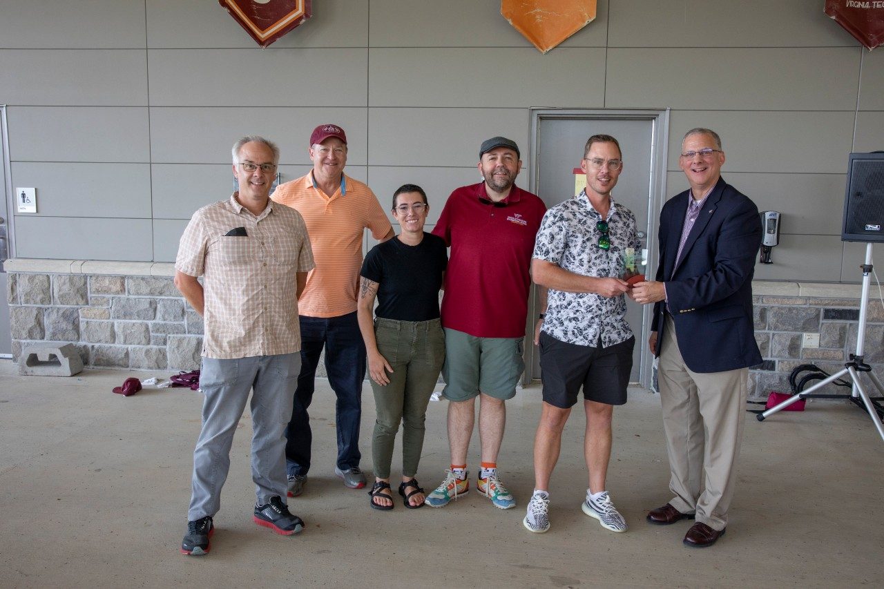 Dean Grant with the second 2022 CALS Team Award Recipient, Virginia Tech Invasive Species Working Group