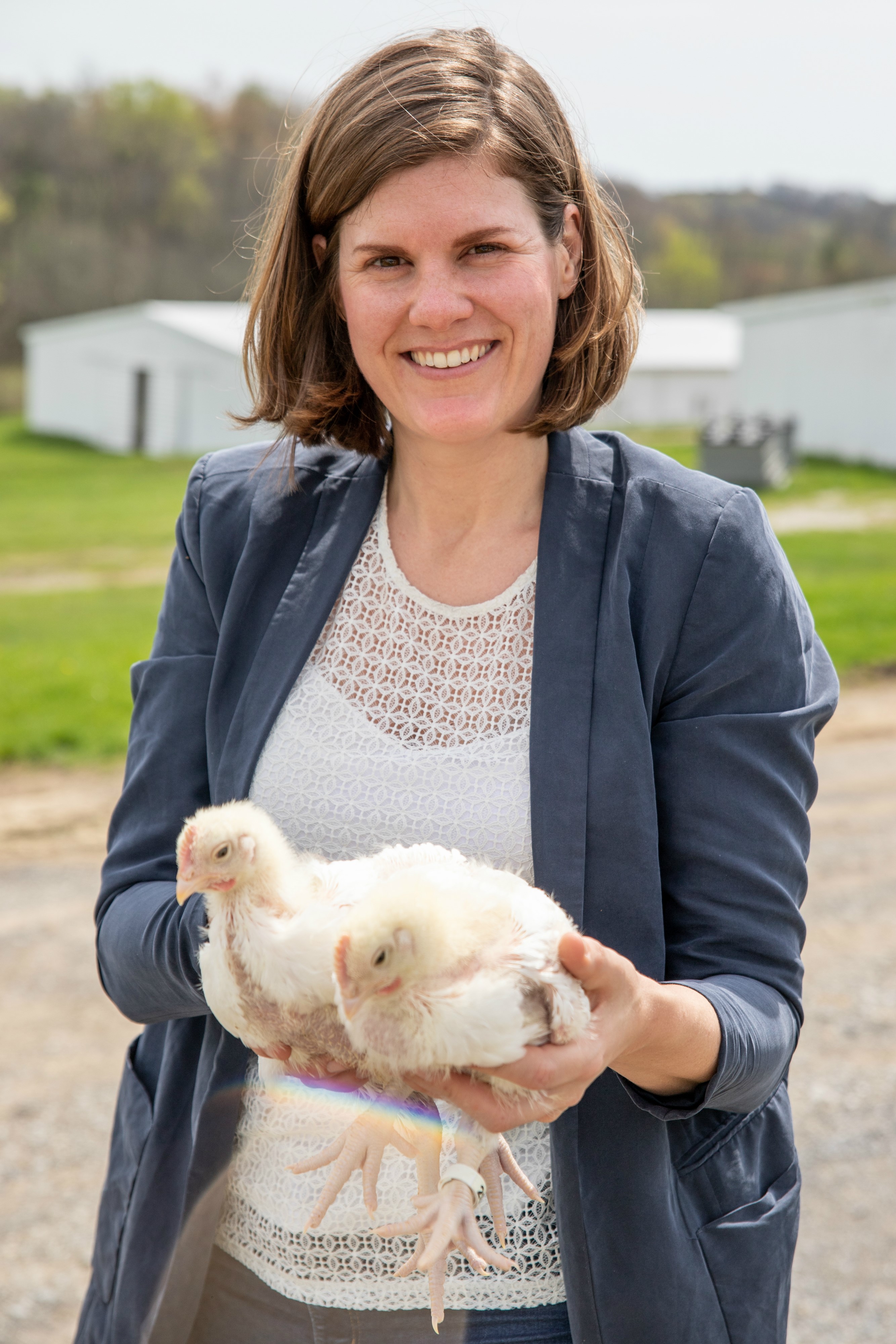 Leonie Jacobs with two chickens
