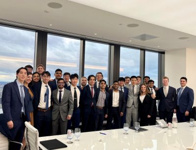 COINS students pose with Stonepeak executives. Photo courtesy of Suddy Sriram ’18, private equity associate at Stonepeak.