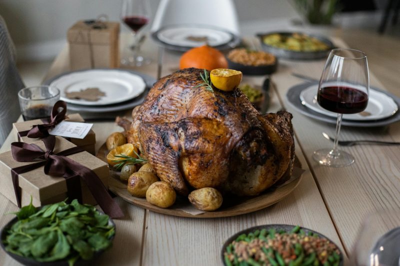 Cooked Thanksgiving turkey on the dining table ready to be served.
